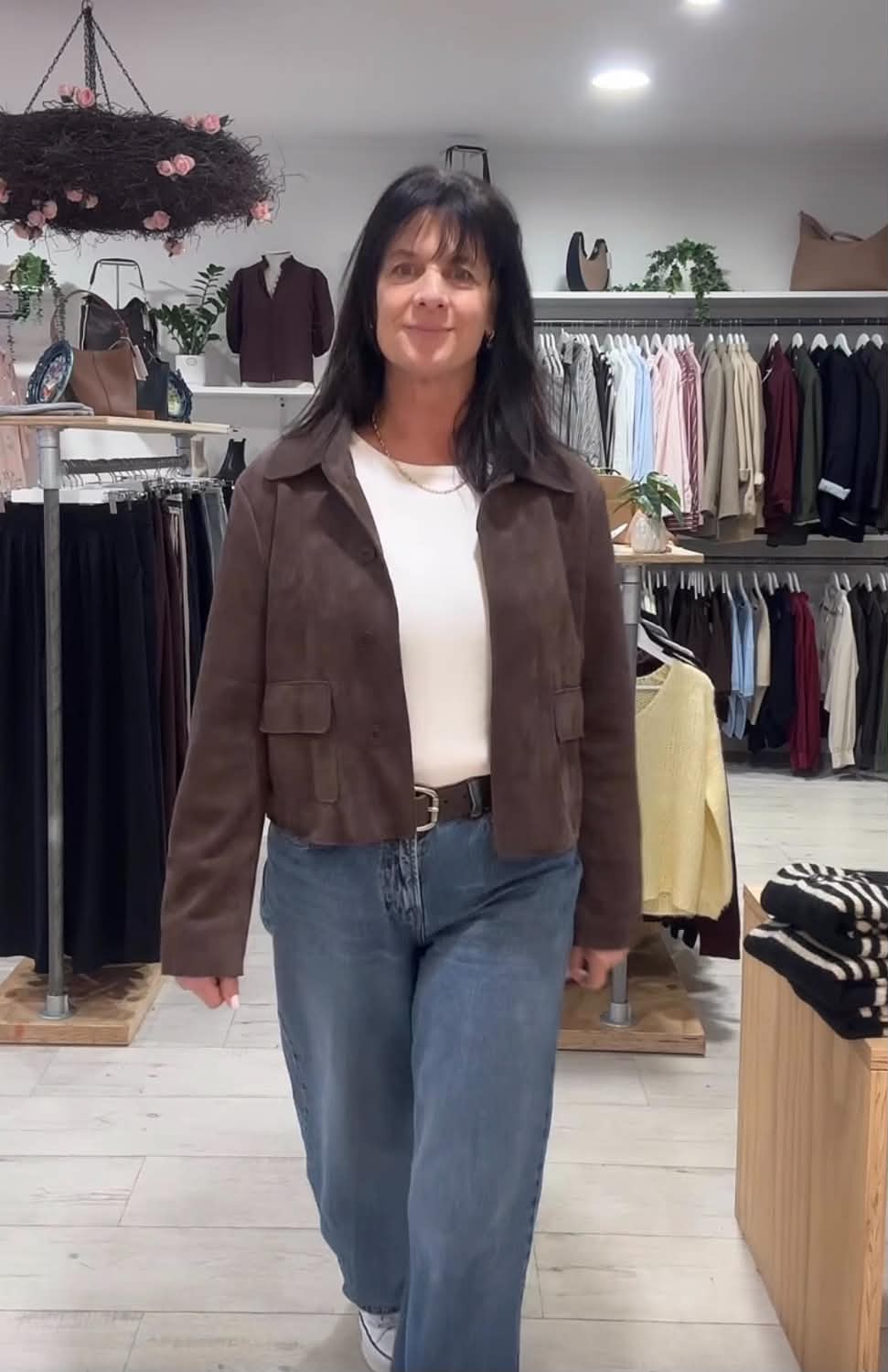 Ange wearing Among the Brave Exhibit chocolate cropped jacket at Absolutely Boutique NZ