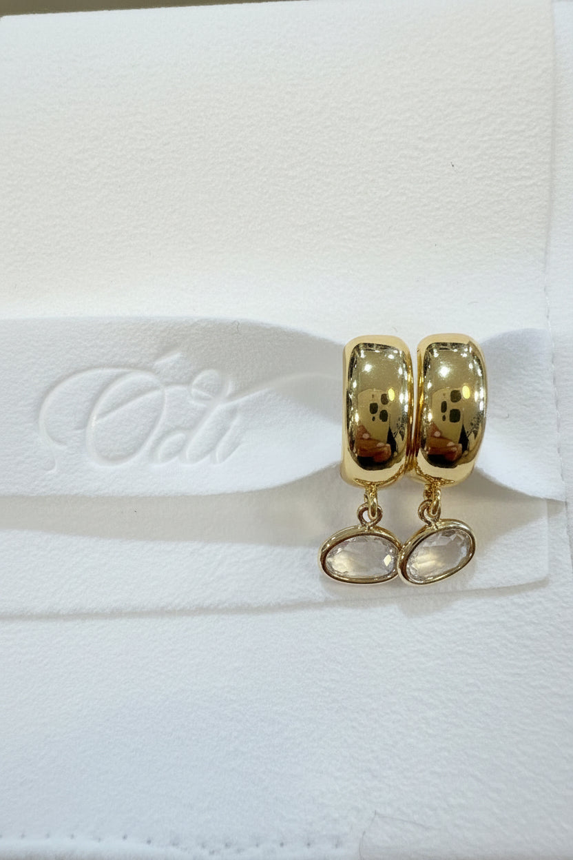 Clear oval Jewels on Gold Huggies